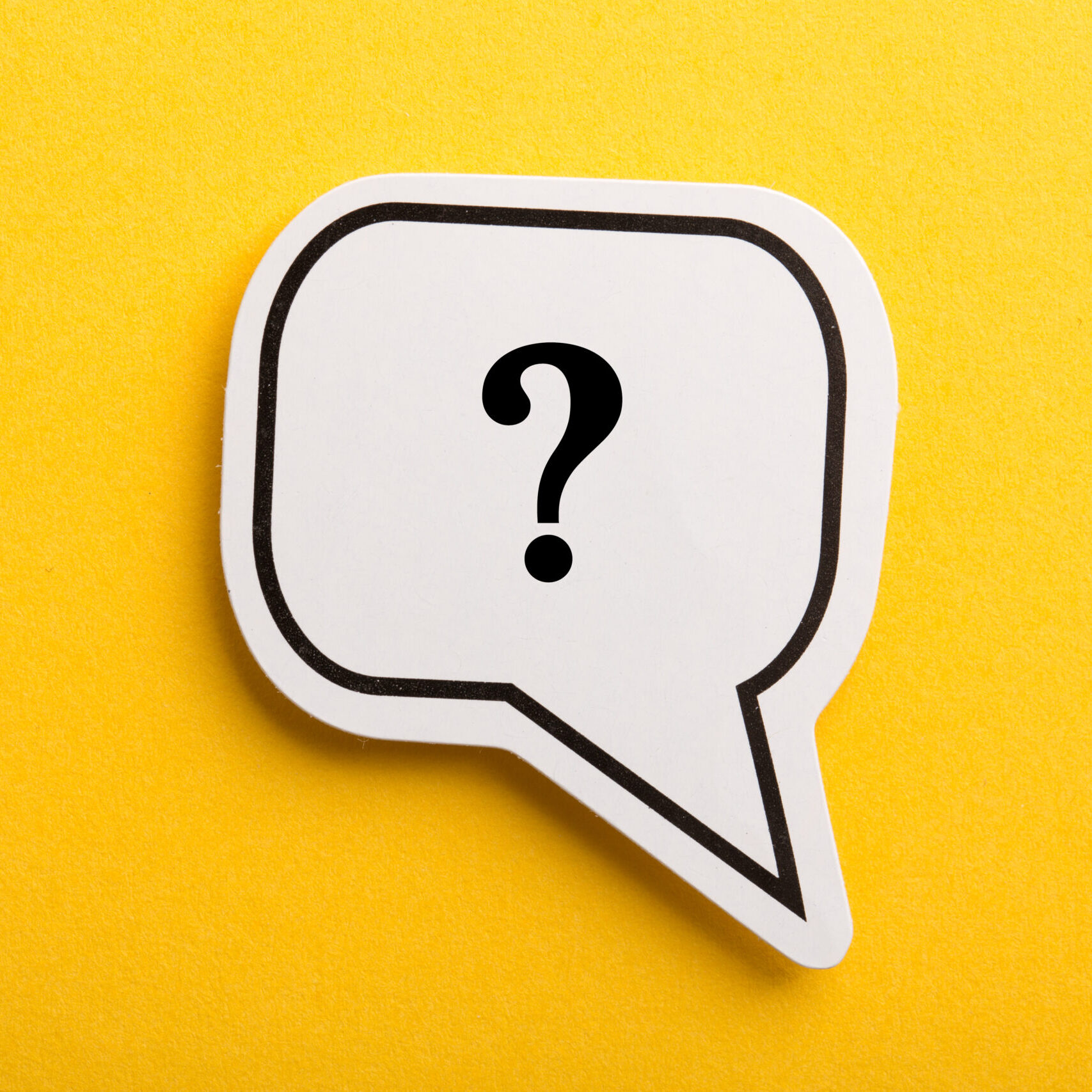 Question mark speech bubble isolated on yellow background.